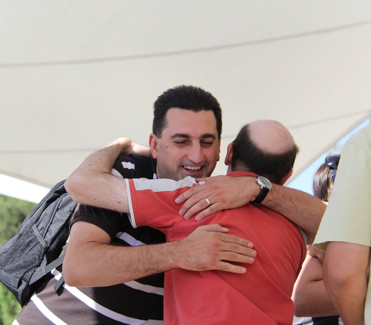 Two old friends in a big hug at GAMMA 2013