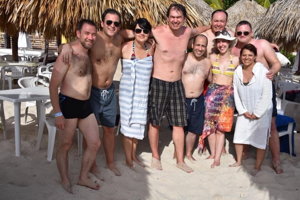 A group of us in swimsuits on the sand at GAMMA 2015