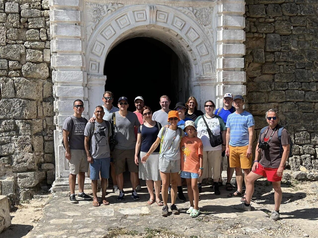 A group of us in front of an old fortress gate in Mozambique
